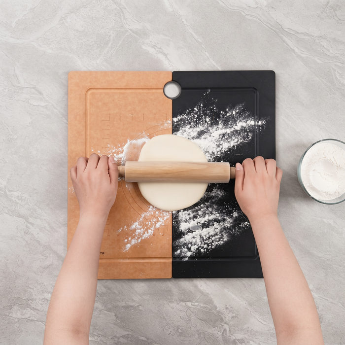Hands rolling out dough on Elihome Camper Series RV sink cover boards dusted with flour