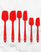Elihome 6-piece premium red silicone spatula set arranged flat. Includes classic, skinny, and mini sizes of spatulas and spoonulas. Features a seamless, heat-resistant design perfect for baking, mixing, and cooking.