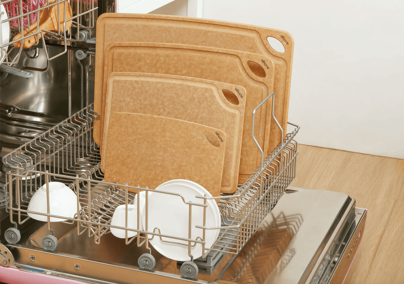 Elihome wood fiber cutting boards in multiple sizes placed in dishwasher rack demonstrating 100% dishwasher safe feature