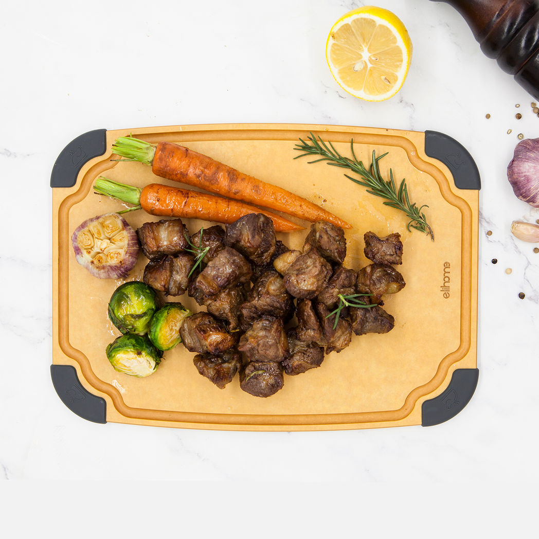 Elihome Essential Series Medium Cutting Board in use on kitchen countertop