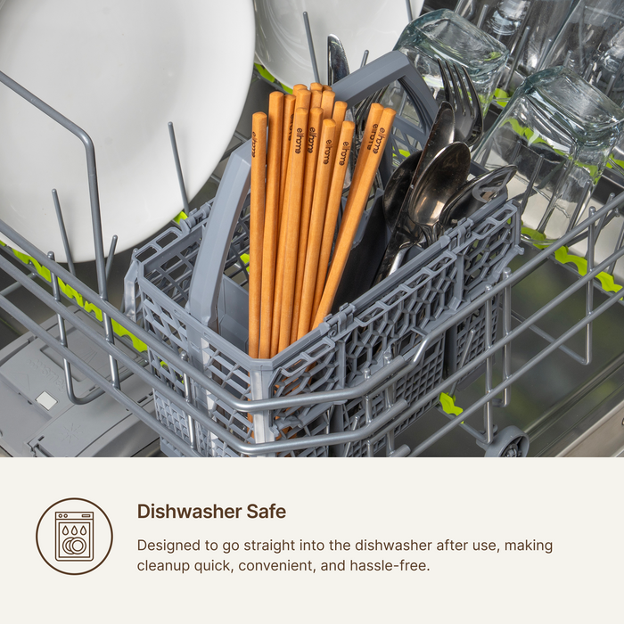 Elihome wood fiber chopsticks standing in a dishwasher basket alongside other utensils, designed to go straight into the dishwasher for quick and hassle free cleanup