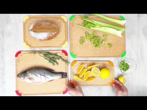 Comprehensive video demonstration of the Elihome fiber wood cutting board, featuring the non-slip silicone feet stability test, deep juice grooves catching liquids, knife-friendly slicing action, and easy dishwasher cleaning.